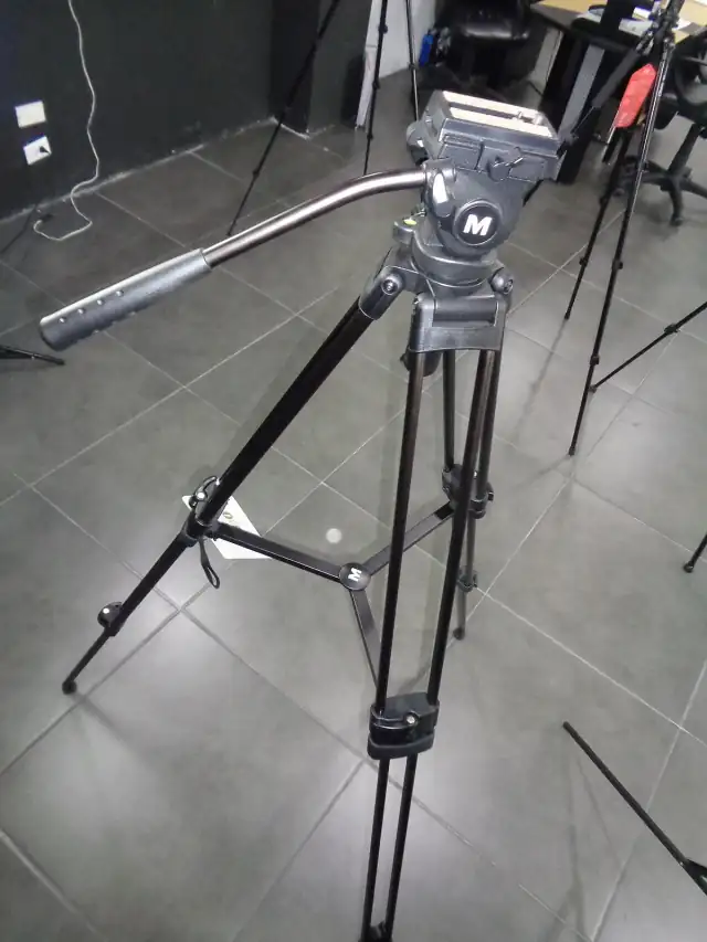 (Photography equipment Tripod Photo Camera Tripod photograph in a studio)