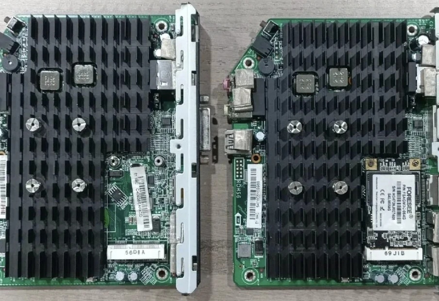 Two compact computer motherboards with passive heatsinks
