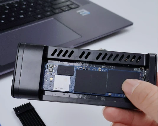 An SSD installed inside an open external enclosure