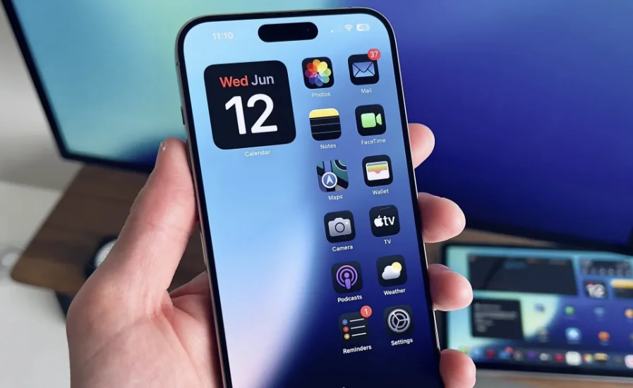 An iPhone home screen with widgets and application icons