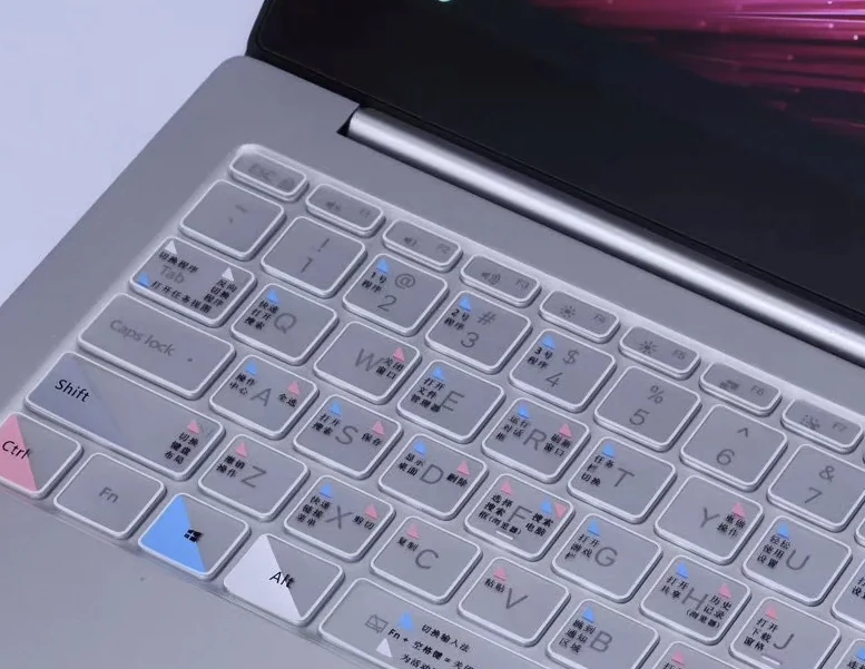 Laptop keyboard with shortcut reference labels on the keys